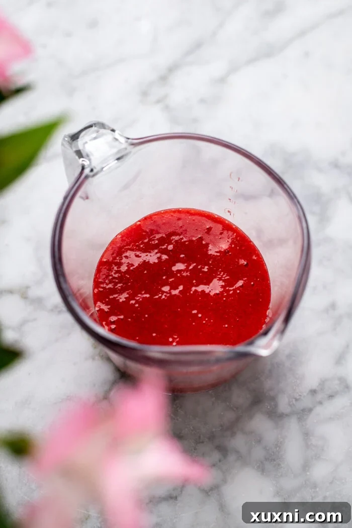 bowl of vibrant strawberry puree, freshly blended