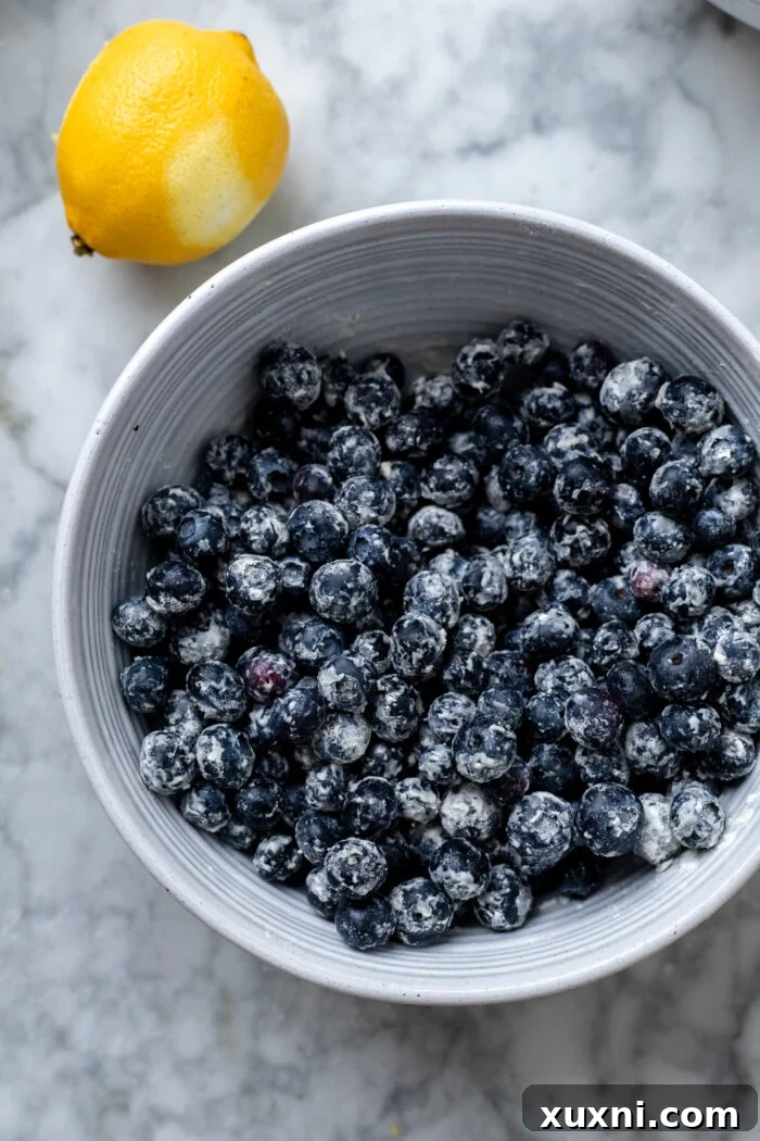 floured blueberries in a bowl