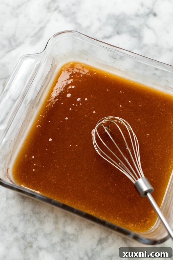 Heavenly Vegan Biscoff Butterscotch Bars 5 butterscotch sauce cooling in a baking tray