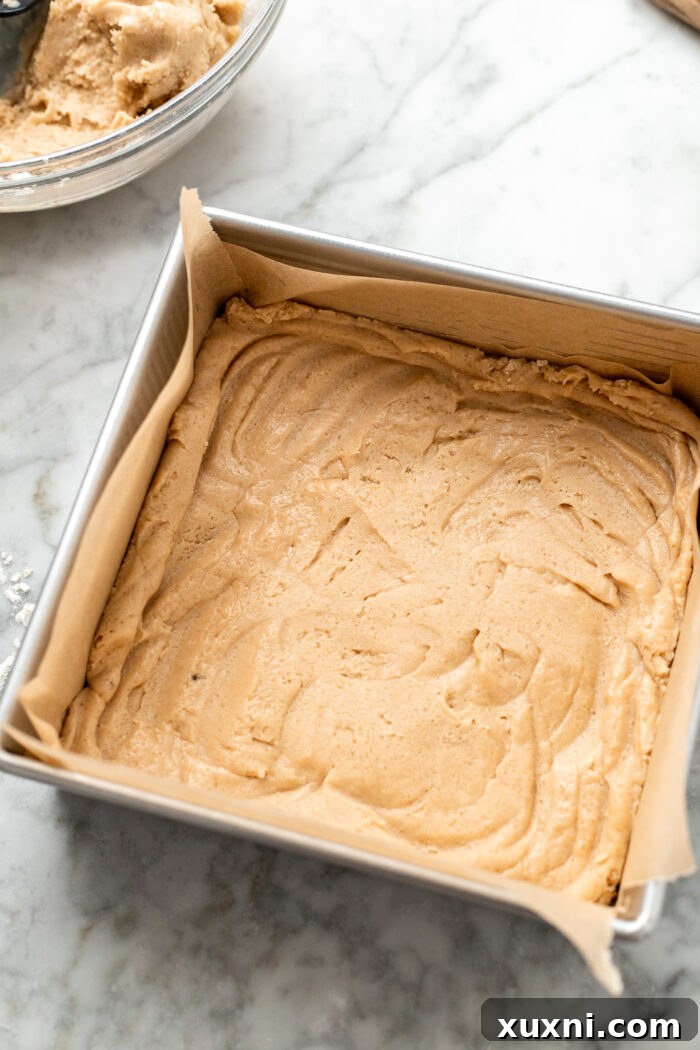 Heavenly Vegan Biscoff Butterscotch Bars 7 baked cookie bar base in a pan