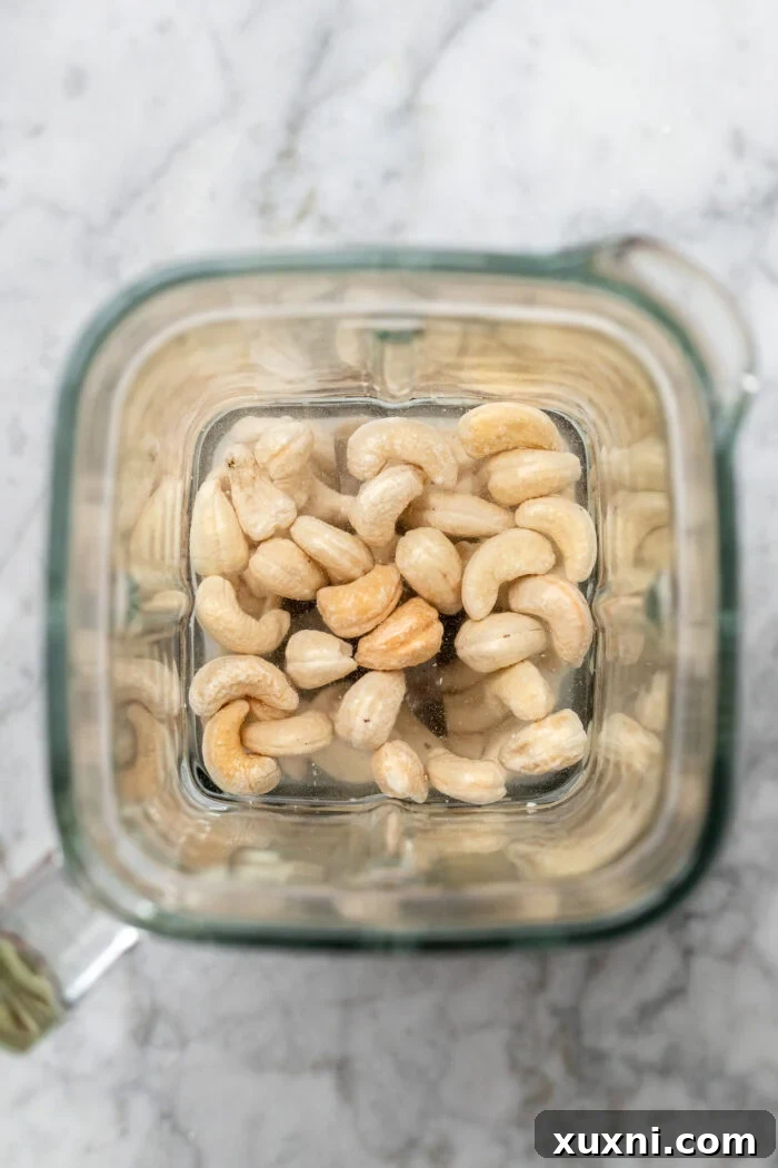 water and cashews in a blender