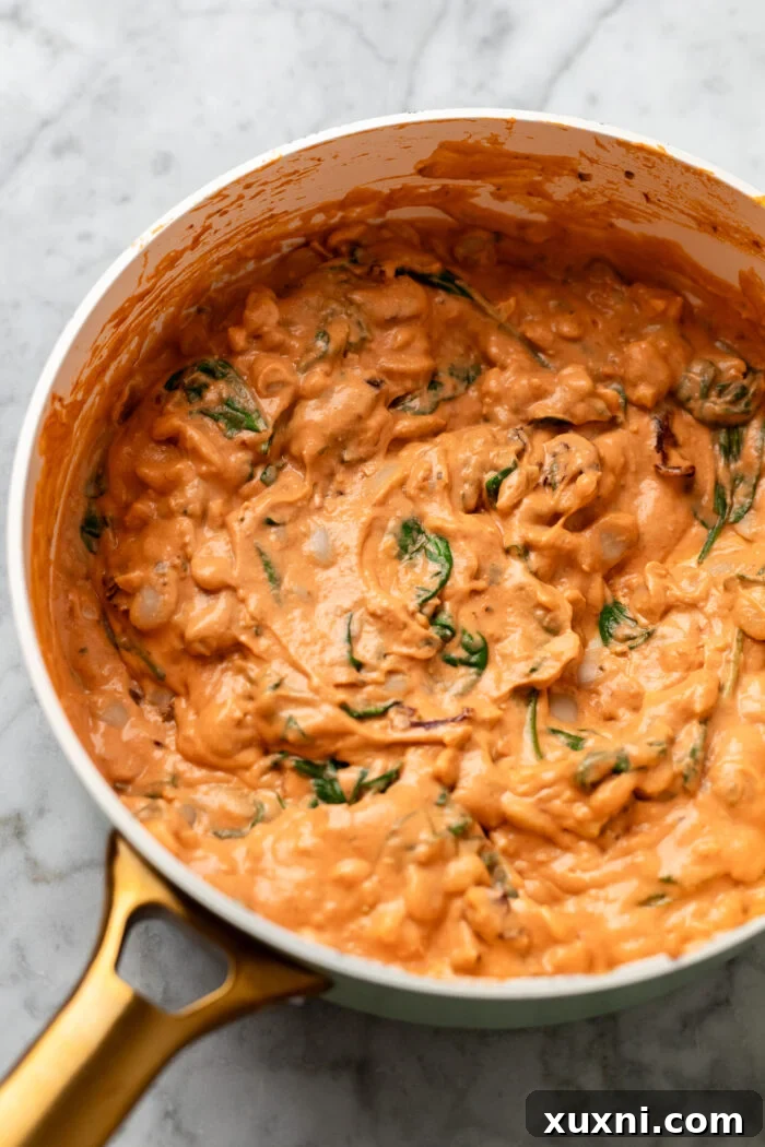 stirring in the spinach