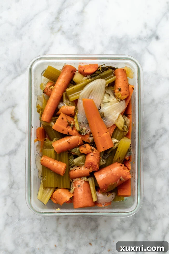 Strained cooked vegetables after making broth, ready for repurposing