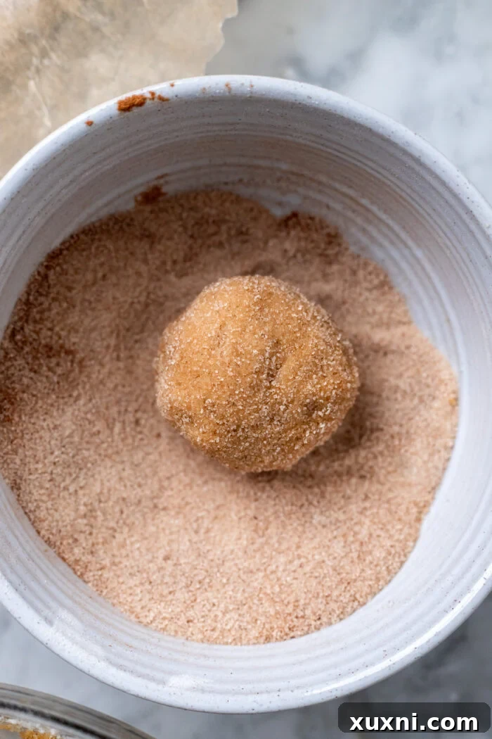 pumpkin cookie dipped in sugar coating.