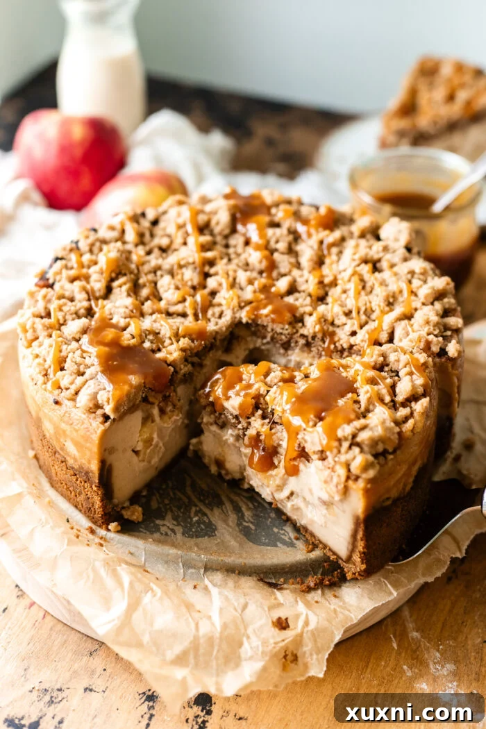 sliced vegan apple crumble cheesecake