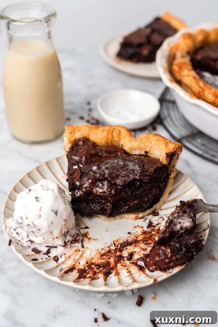 slice of vegan brownie pie on a plate