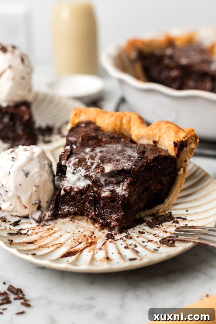 bitten slice of brownie pie