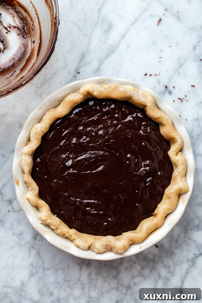 poured brownie batter into pie crust