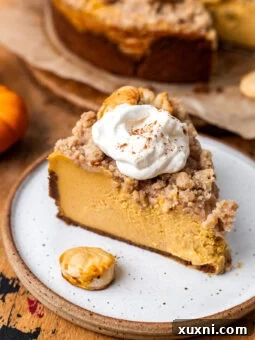 sliced vegan pumpkin cheesecake on a plate