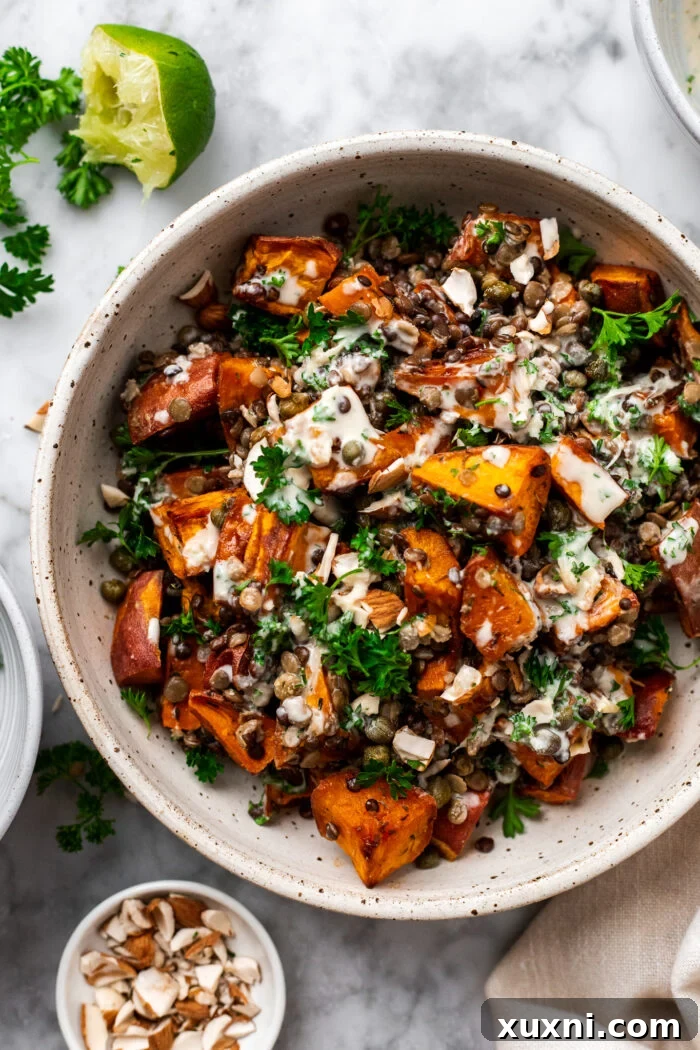 Simple roasted sweet potato lentil salad in a bowl, a healthy and delicious plant-based meal