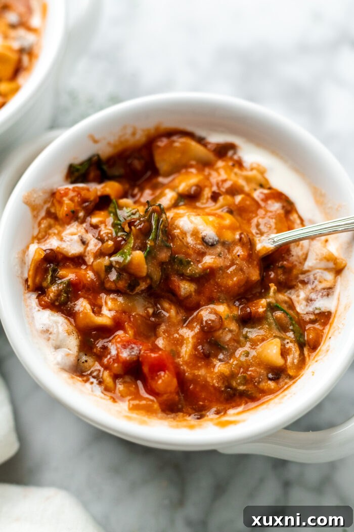 close up of vegan lasagna soup in a bowl
