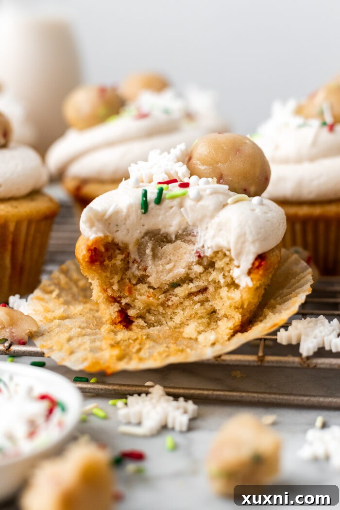bitten vegan cookie dough cupcake showing the rich layers