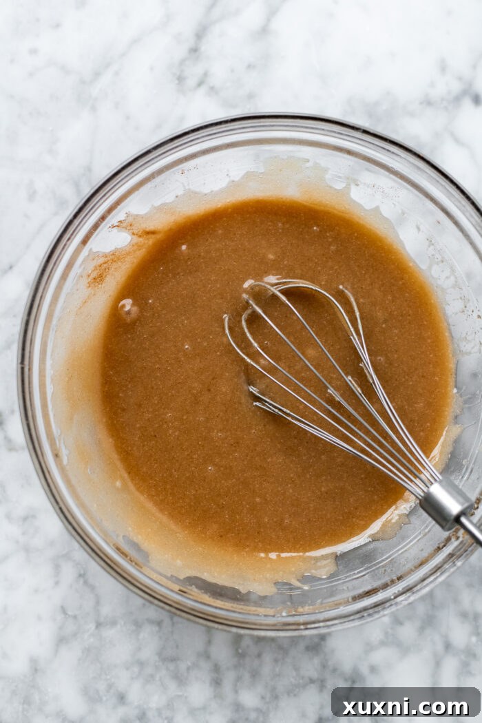 Easy Soft and Chewy Vegan Oatmeal Cream Pies 6 Wet ingredients, including browned vegan butter, whisked together in a mixing bowl