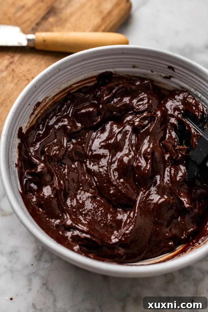 Vegan Small Batch Caramel Nut Brownies 11 Step 6: Folding chocolate chips into the finished brownie batter