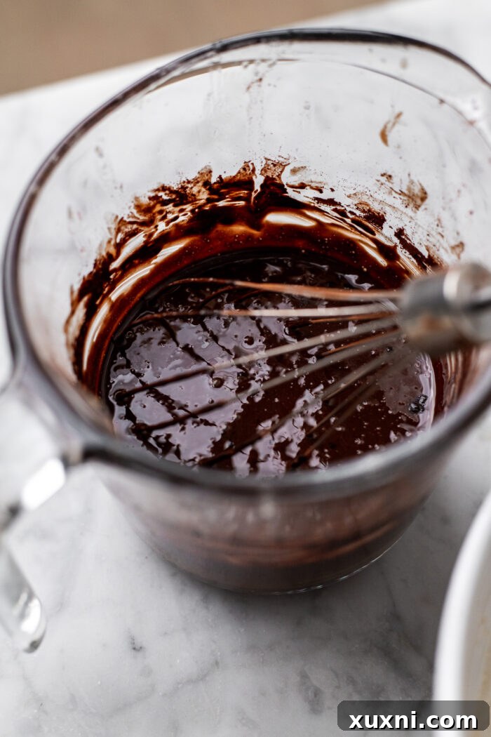 Vegan Small Batch Caramel Nut Brownies 7 Step 2: Smooth vegan fudge sauce in a bowl after mixing