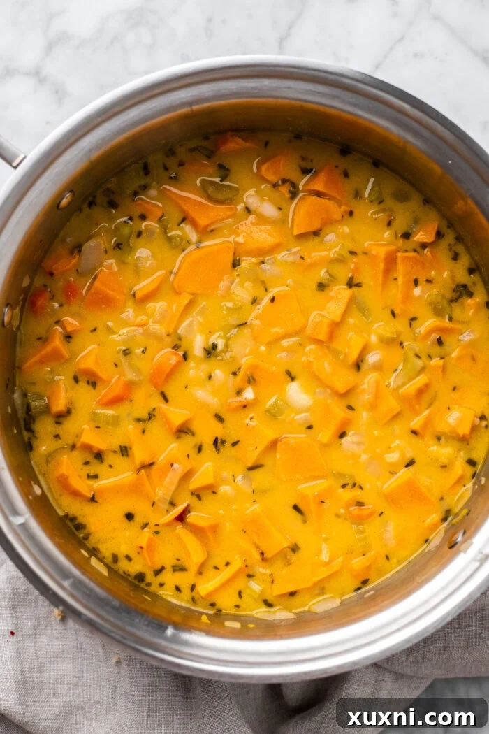sweet potato soup cooking in broth