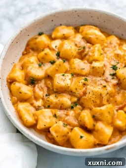 bowl of marry me tofu and gnocchi, a delicious vegan dish