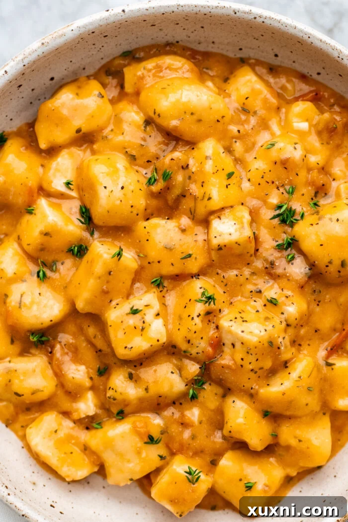 close up of marry me tofu in a rustic bowl