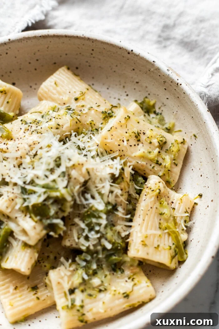 close up of pasta con broccoli in a pot