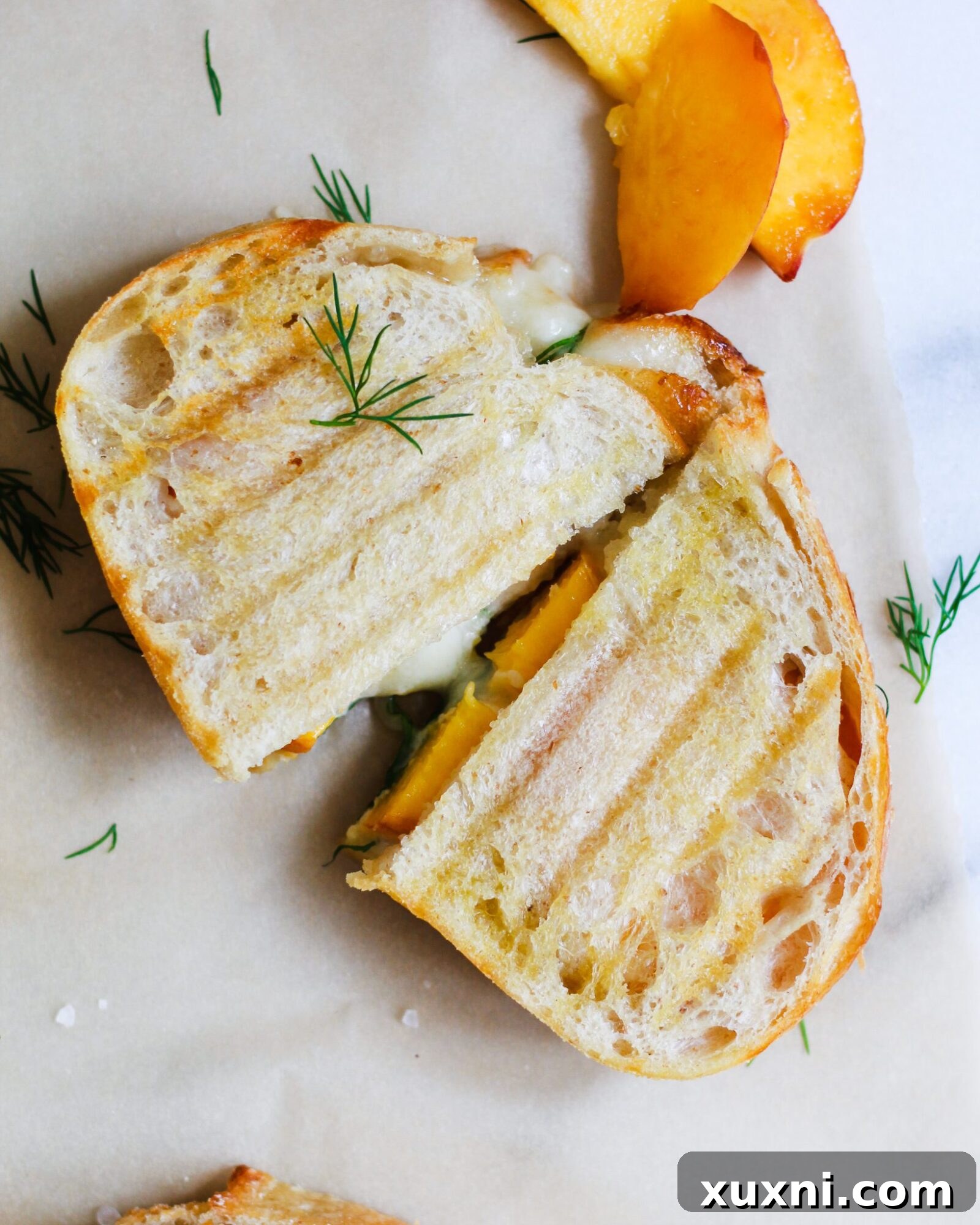 sliced brie peach grilled cheese sandwich