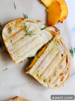 sliced brie peach grilled cheese sandwich
