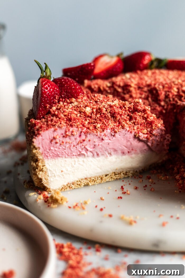 sliced strawberry crunch cheesecake