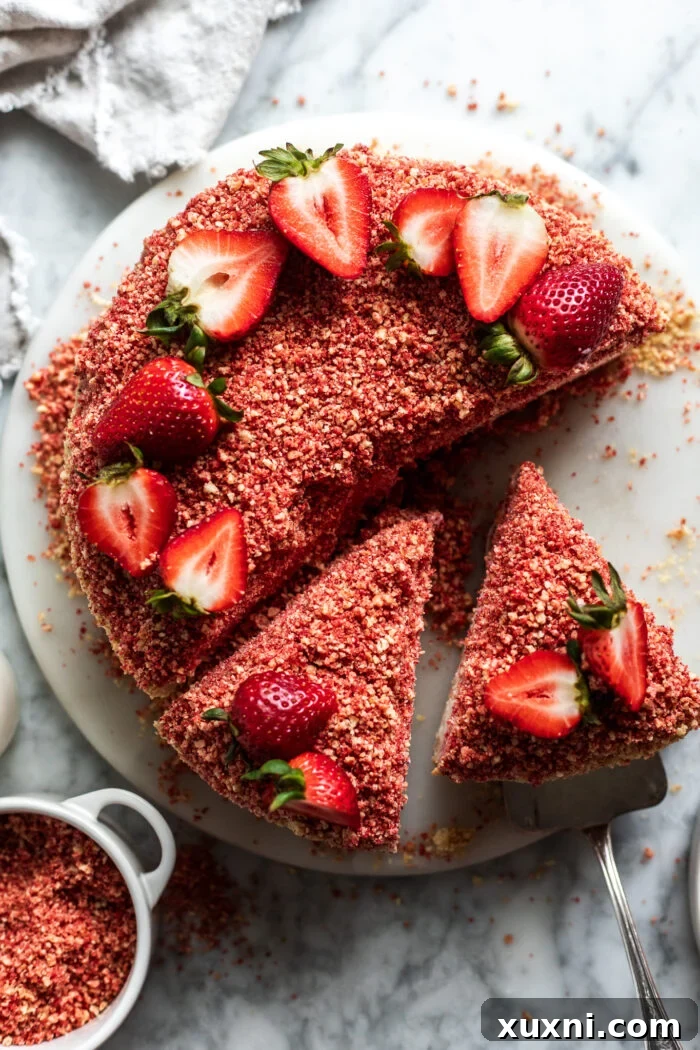 sliced vegan strawberry crunch cheesecake