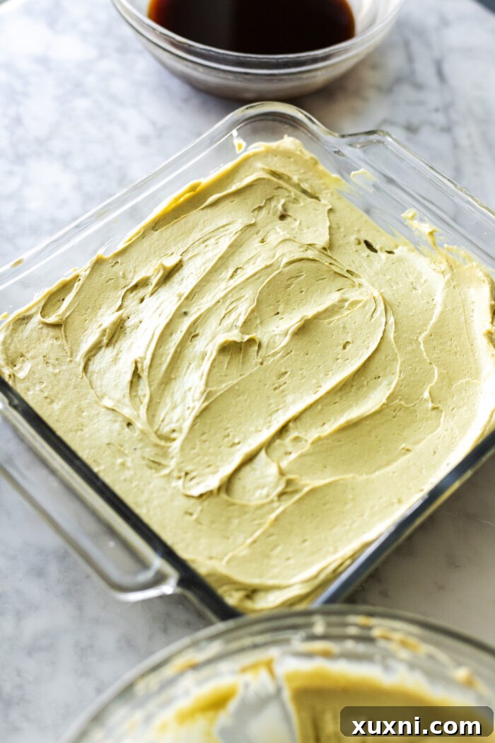 pistachio cream on top of ladyfingers