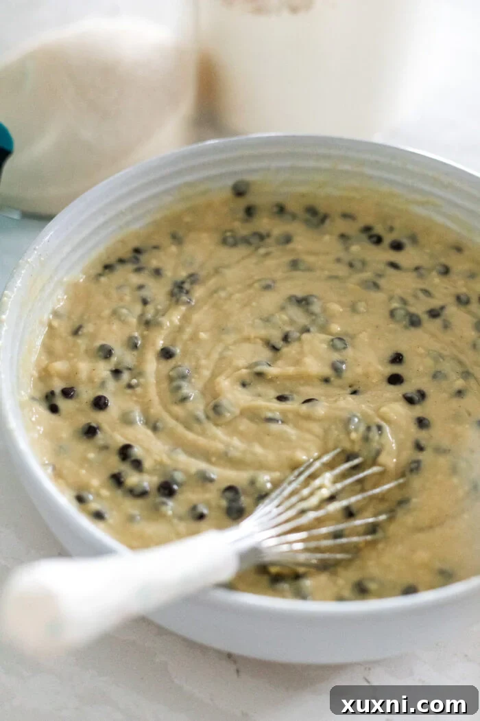 Mind-Blowing Vegan Cannoli Cake 7 creamy vegan cannoli cake batter in a bowl