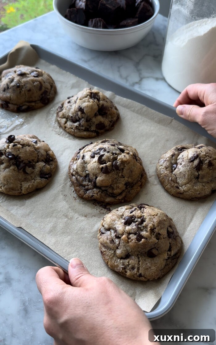 Vegan Brown Butter Brownie Cookie Fusion 6 Freshly baked brownie stuffed cookies cooling on a rack