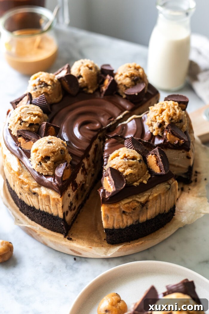 perfectly sliced vegan peanut butter cookie dough cheesecake