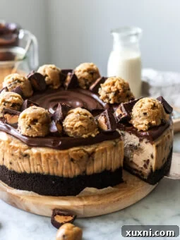 sliced peanut butter cookie dough cheesecake, showcasing its creamy texture