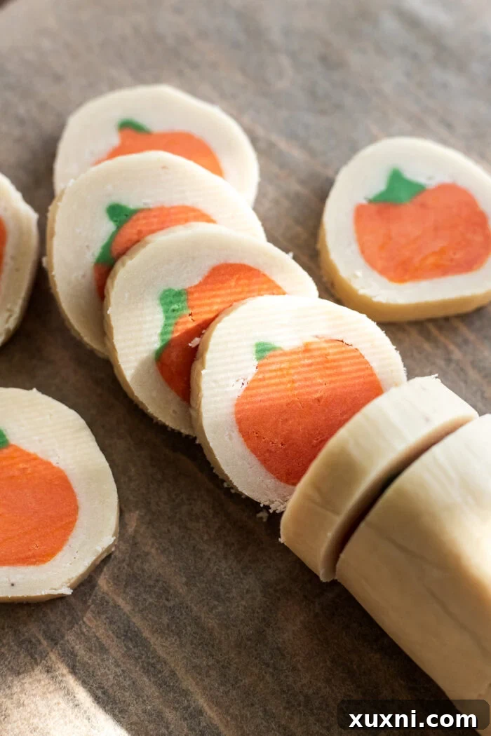 pumpkin sugar cookies sliced before baking