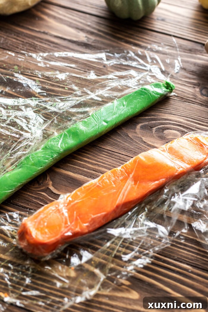 forming the pumpkin sugar cookies
