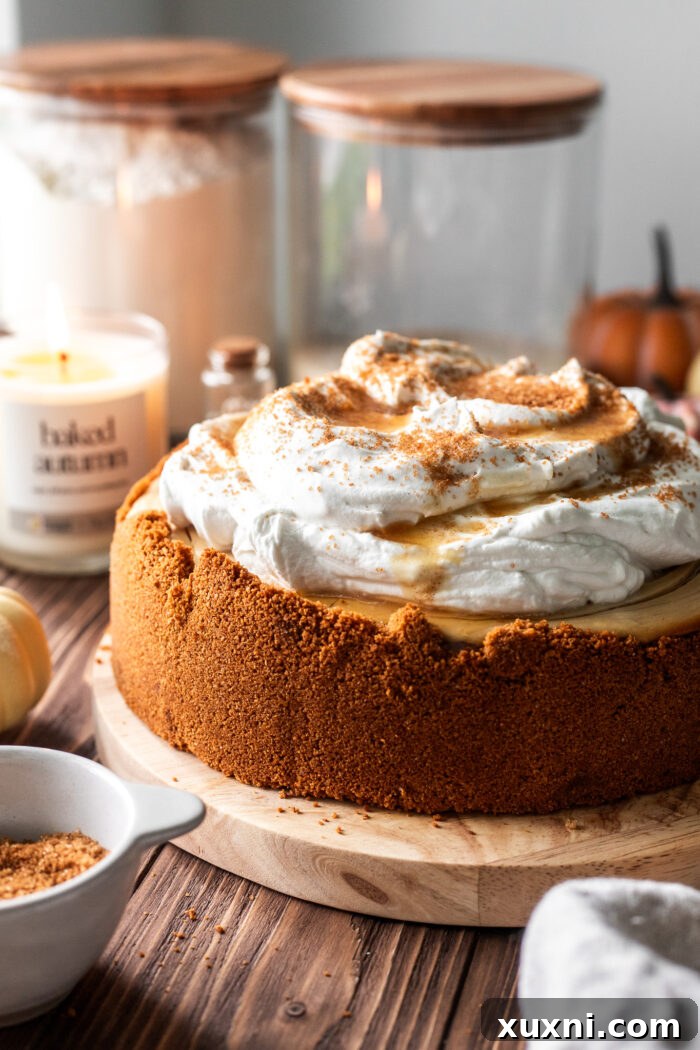 Vegan mascarpone cheesecake displayed with the Baked Autumn candle