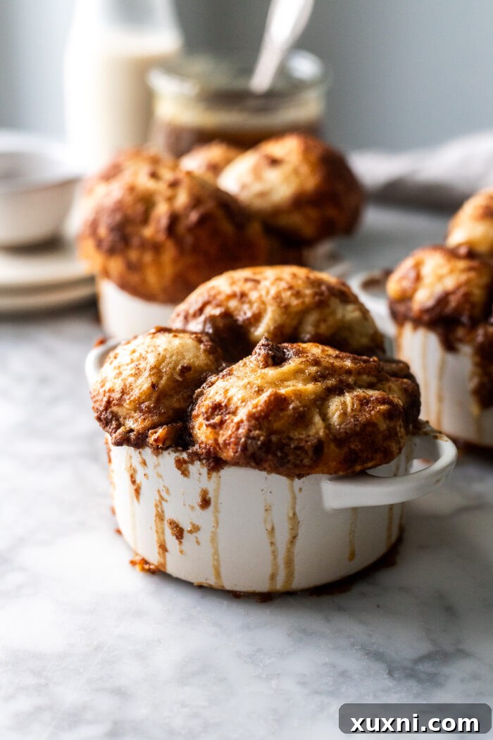 Freshly baked small batch monkey bread, golden brown and glistening with toffee sauce, straight from the oven