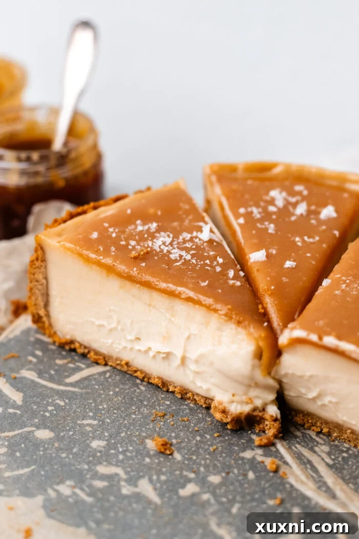 Several slices of vegan caramel cheesecake artfully arranged on a plate
