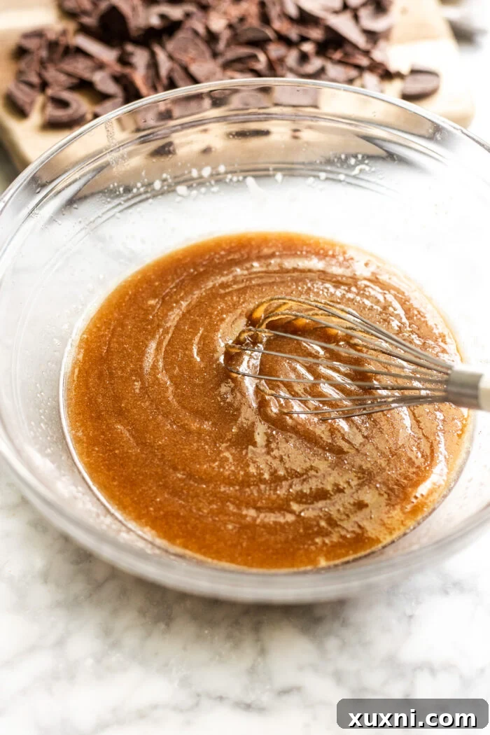 Vegan s'mores cookie dough being mixed in a bowl.
