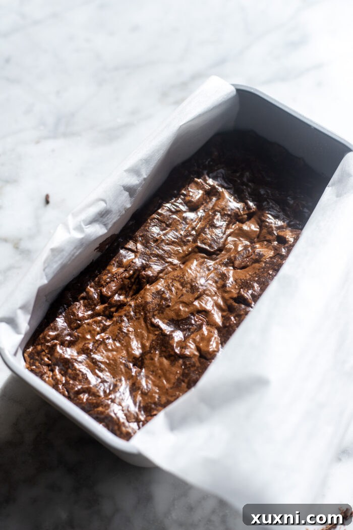 Freshly baked brownies cooling on a wire rack