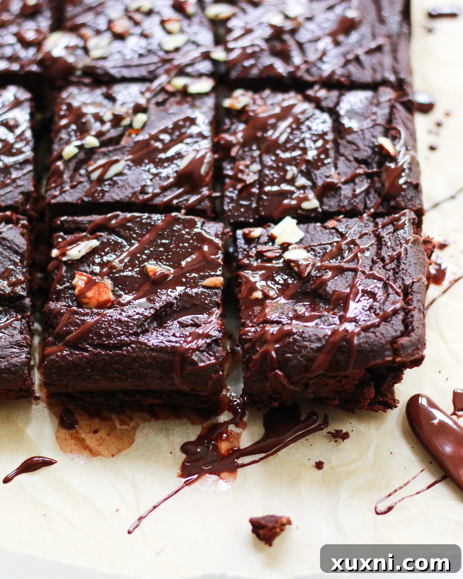 3/4 shot of brownies drizzled in chocolate