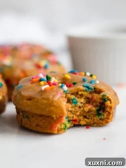 close up of donut with bite taken out of it