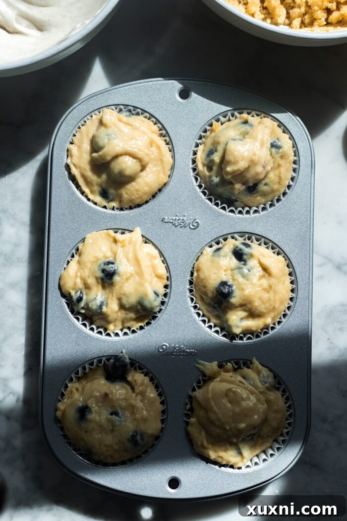 making the lemon blueberry muffins