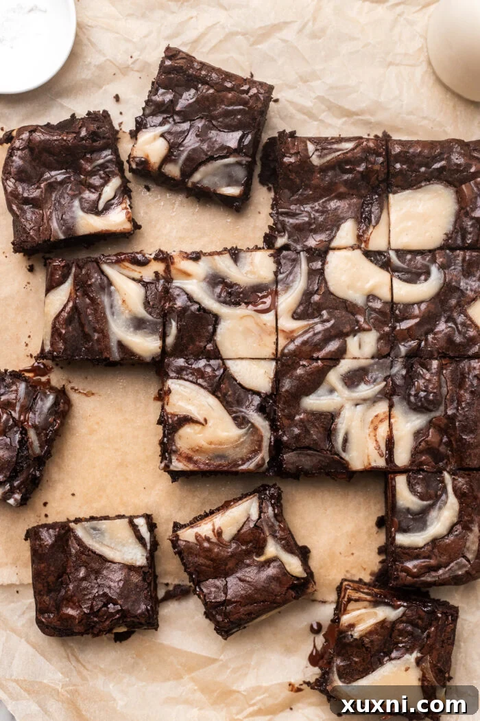 brownies spread out on parchment paper