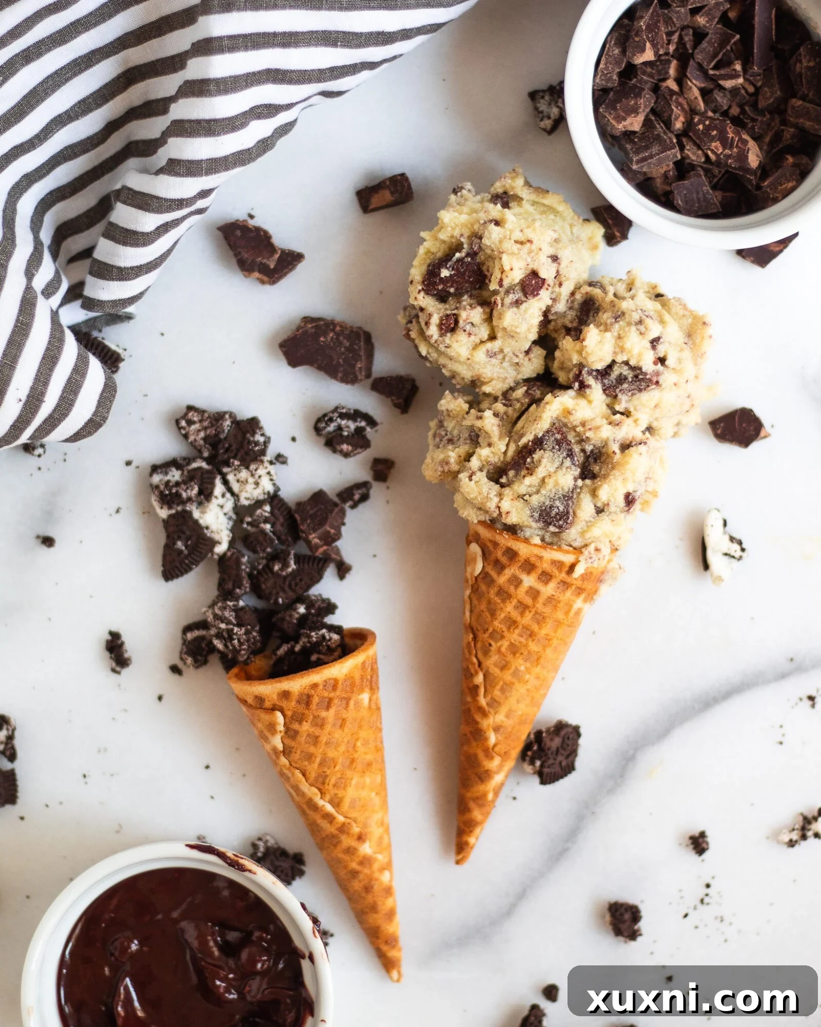 scoop of cookies n' cream on ice cream cone