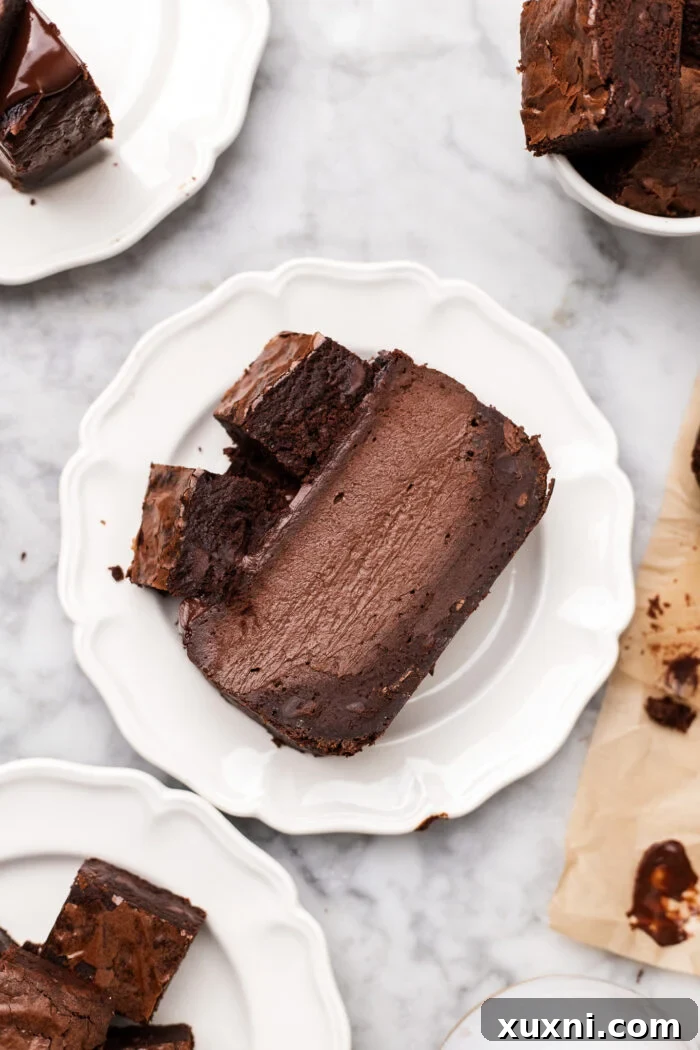 A delectable plate of sliced vegan brownie Basque cheesecake, showcasing its appealing layers and burnt top.