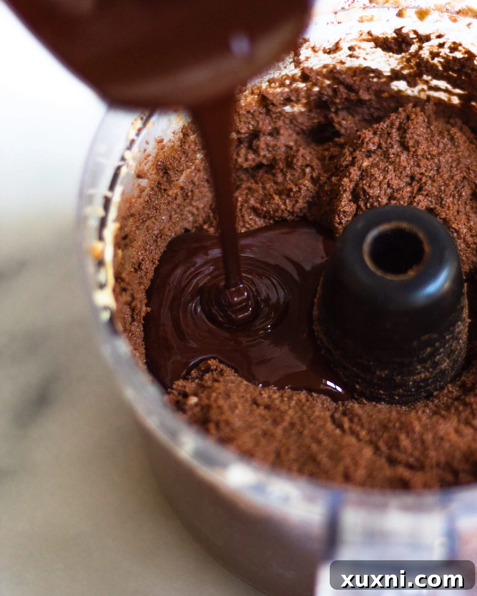chocolate poured into chocolate pie filling
