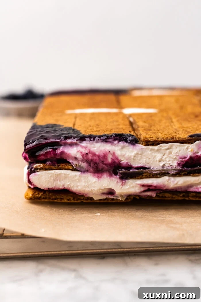 The chilled icebox cake, removed from the pan, before being topped with fresh whipped cream.