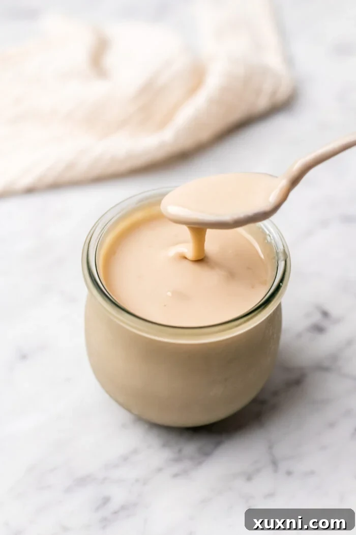 jar of vegan sweetened condensed milk 