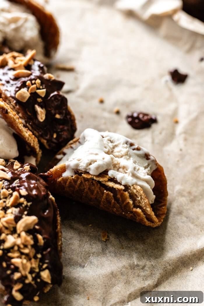 Gently warming a vegan stroopwafel in a microwave to prepare it for shaping into a mini choco taco shell.