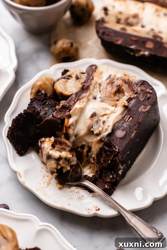 Plant-Powered Brookie Basque Cheesecake Bars for Small Cravings 12 A close-up of a bitten small batch vegan brookie Basque cheesecake bar, showing the perfect layers and creamy interior.